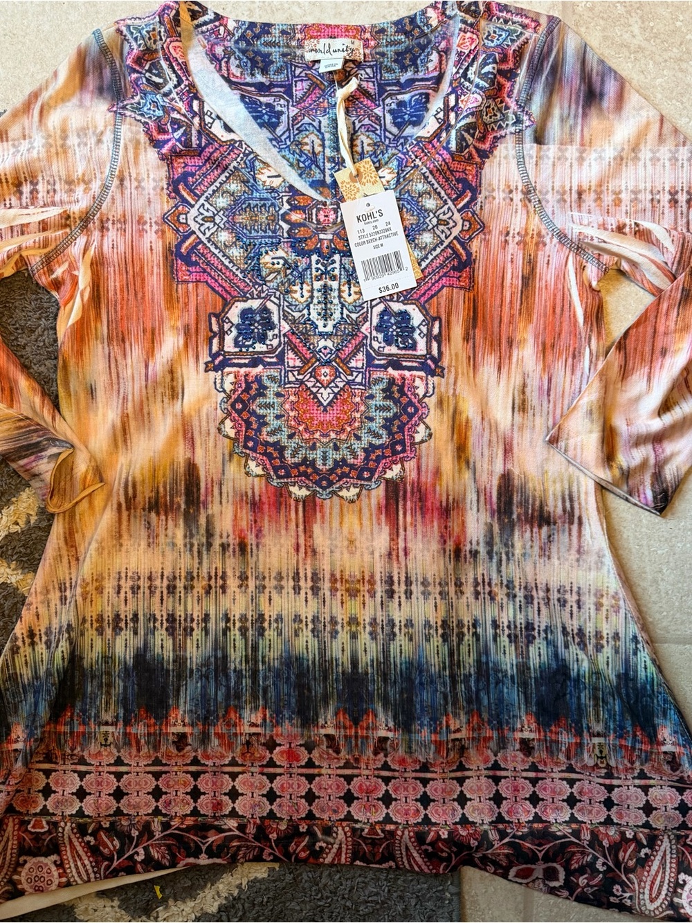 World Unity women’s multi-colored 3/4 sleeved shirt! New with tags!